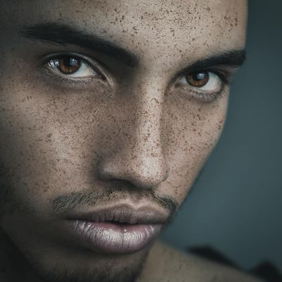 Close up of a person closing eyes for relaxation.