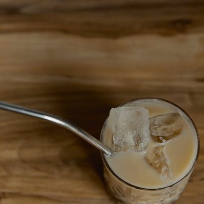Soft light hitting a wooden table surface.